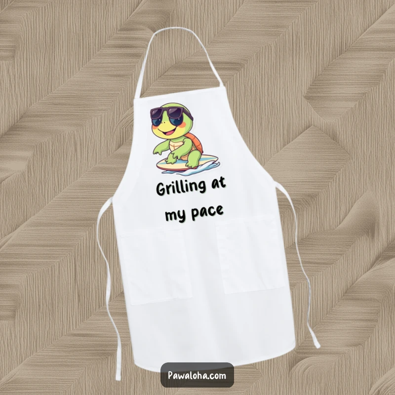 Funny turtle wearing sunglasses and surfing on a surfboard, featured on a humorous kitchen apron.