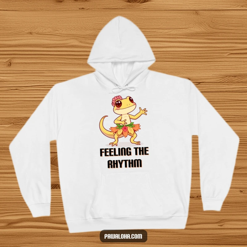 Funny Kawaii gecko wearing a hula skirt, dancing gracefully, on a soft and warm hoodie.