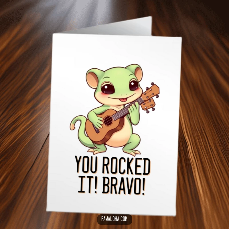 Funny Free Printable Congratulations Card: A Kawaii gecko joyfully strumming a ukulele to celebrate your win.