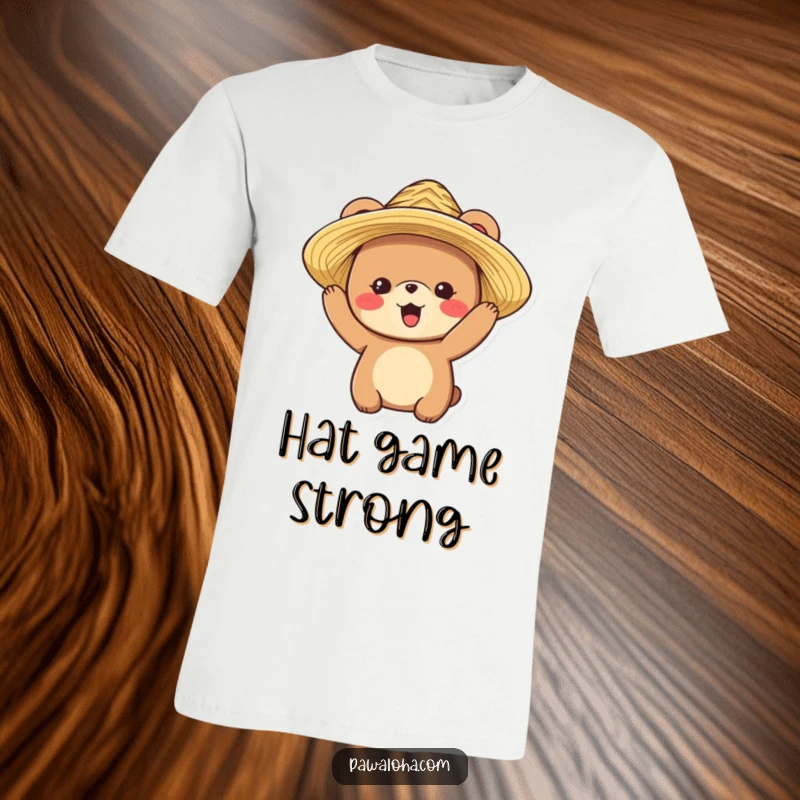 Funny t-shirt featuring a delighted bear character joyfully trying on a stylish straw hat, ready for adventure.