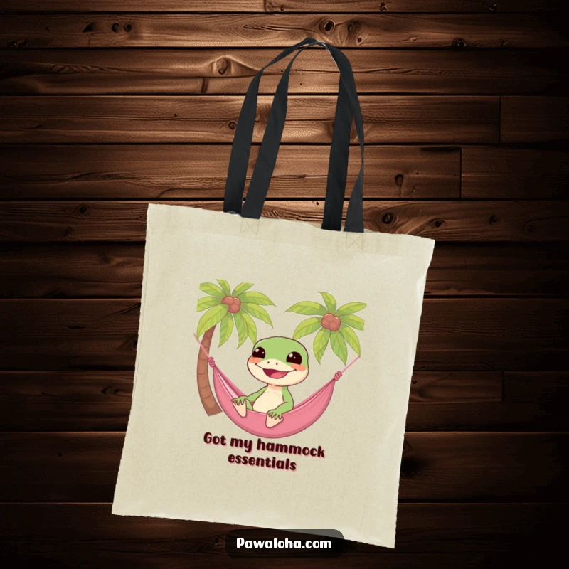Funny gecko lounging in a hammock between palm trees, a humorous and practical tote bag design.